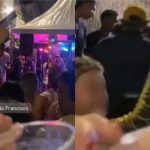Jovem exibe arma em baile funk