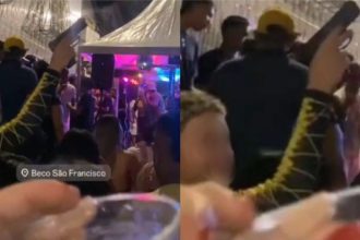 Jovem exibe arma em baile funk