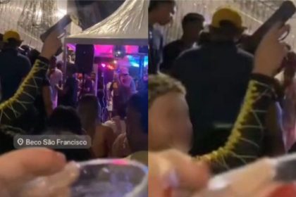 Jovem exibe arma em baile funk