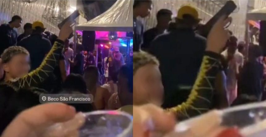 Jovem exibe arma em baile funk