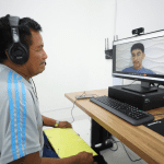 Imagem colorida mostra atendimento onlinne Defensorua Pública do Amazonas