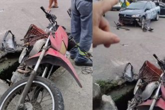 Vídeo: Motocicleta cai em buraco de esgoto após acidente em Manaus