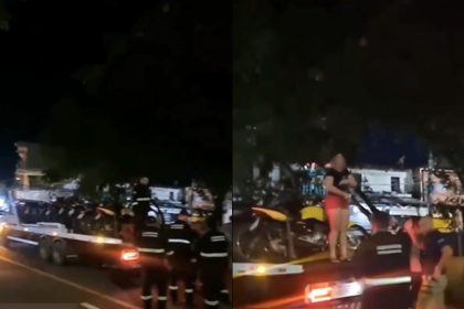 Vídeo: mulher sobe em caminhão para impedir apreensão de moto