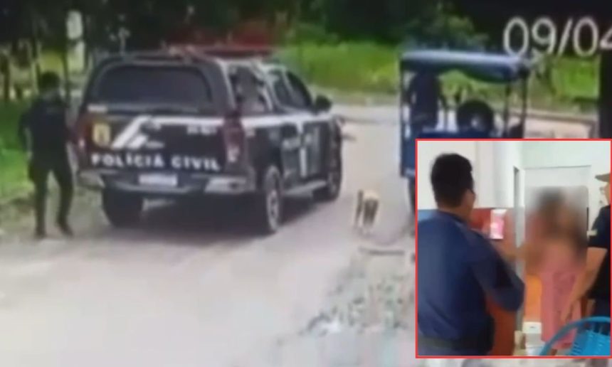 Três guardas municipais em Tefé, Amazonas, são flagrados em possível situação de abuso de autoridade. Um deles segura uma mulher, enquanto outro conversa com ela.