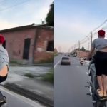 Um motociclista em Manaus realiza uma manobra perigosa em uma via pública, colocando em risco sua segurança e a de outros motoristas.
