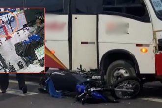 Acidente entre motocicleta e ônibus registrado por câmera de segurança.