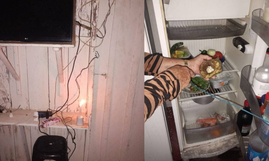 Apagão em Lago Janauacá: pessoa usa vela e abre geladeira