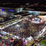 Evento Arraial do ViaNorte com público, palco e barracas