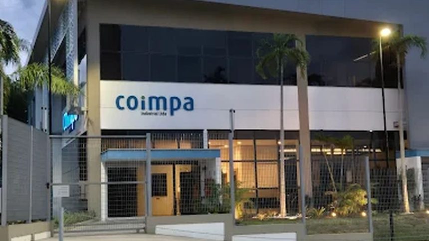 Fachada da Coimpa Industrial Ltda em Manaus, com céu nublado.