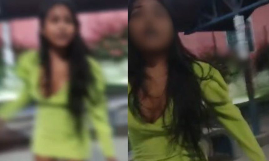 Mulher em vestido verde em Manaus, relacionada a acusações de não pagamento de corridas de aplicativo.