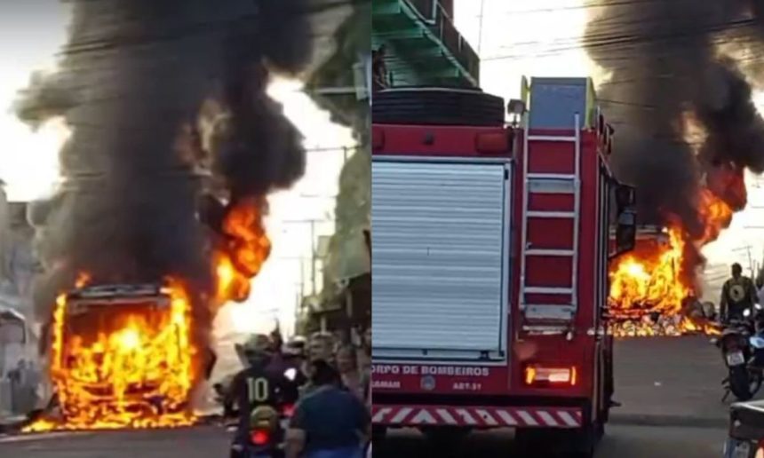 Ônibus em chamas no Distrito Industrial após incêndio.