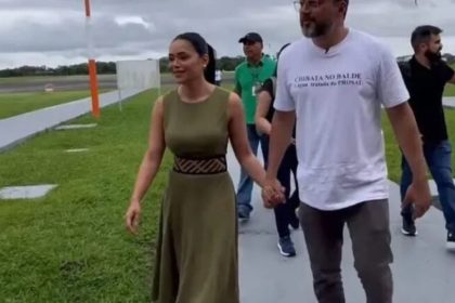 Wilson Lima e Andrezza Brito de mãos dadas caminhando juntos