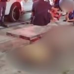 Acidente com vítimas na Avenida Margarita, com policiais e pessoas ao redor.