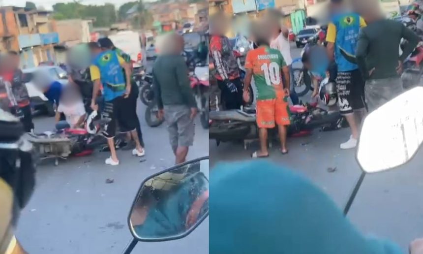 Acidente de trânsito com motociclista e criança feridos em rua.
