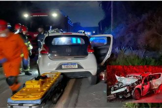 Acidente na BR-174: Carro danificado e socorristas no local.