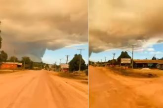 Céu alaranjado e tempestade de fumaça sobre cidade de Apuí, Amazonas, em dia de crise ambiental.