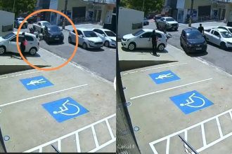 Colisão entre carro e moto em rua no bairro Nossa Senhora das Graças.