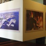 Exposição de fotos de Ismael Neves no Palácio Rio Negro, com fotos de cidades e eventos.