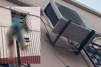 Homem tenta invadir igreja e cai, com ar-condicionado e janela de grade.