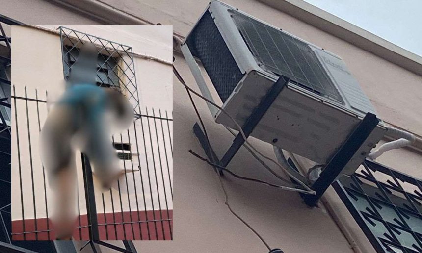 Homem tenta invadir igreja e cai, com ar-condicionado e janela de grade.