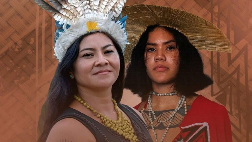 Mulheres indígenas com cocares e adornos participam de projeto cultural em Manaus.