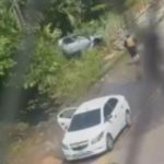 Veículo em cena de investigação. Suspeito de assassinato preso.