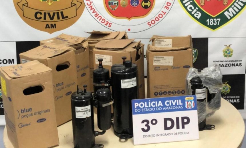 Apreensão de produtos roubados: compressores de ar condicionado e caixas da Midea apreendidos pela polícia civil.