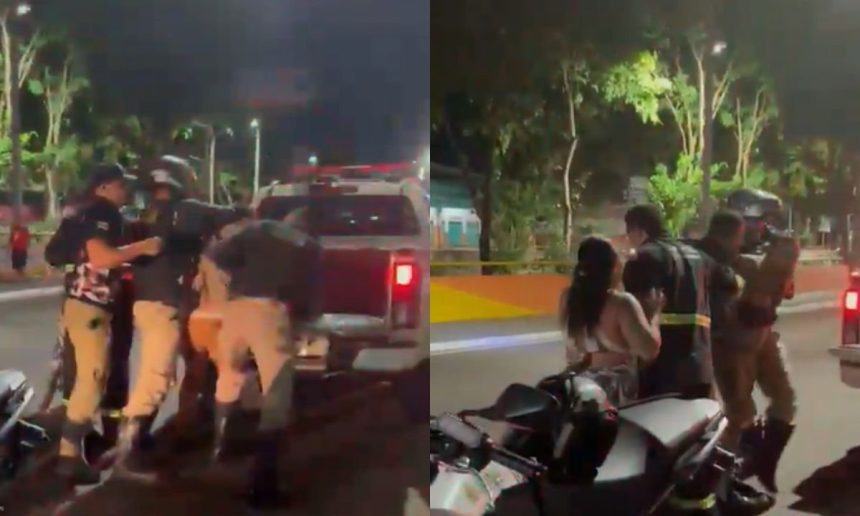 Fiscalização do Detran-AM em Compensa resulta em confusão. Policiais e pessoas envolvidas em cena noturna.