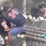 Idoso sendo resgatado em enchente por populares em Santos