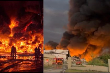Incêndio em fábrica no Distrito Industrial II, Manaus, com bombeiros combatendo as chamas e fumaça densa.