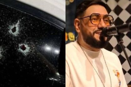 Janela de carro com marcas de tiros e cantor Dubarranco no palco.