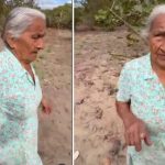 Joaninha, idosa de 90 anos, em vídeo viral, com camisa florida e expressão séria.