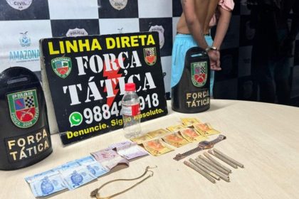Material apreendido em ação policial: dinheiro, cigarros, relógio e objetos.