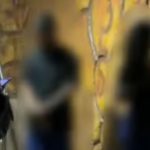 Pessoas desfocadas em pousada, possivelmente relacionadas a caso de adolescente.