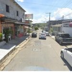 Rua Catalão no bairro Novo Aleixo em Manaus, com carros e prédios.