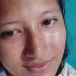 Foto de rosto de jovem mulher, olhos castanhos, em ambiente interno, possivelmente Manaus.
