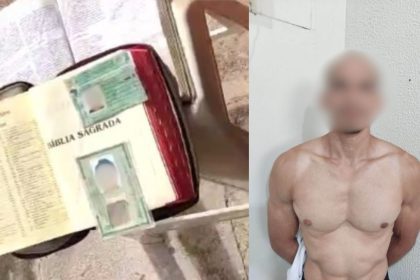 Homem com Bíblia Sagrada e documentos