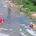 Homem ensanguentado em rio após agressão e esfaqueamento.
