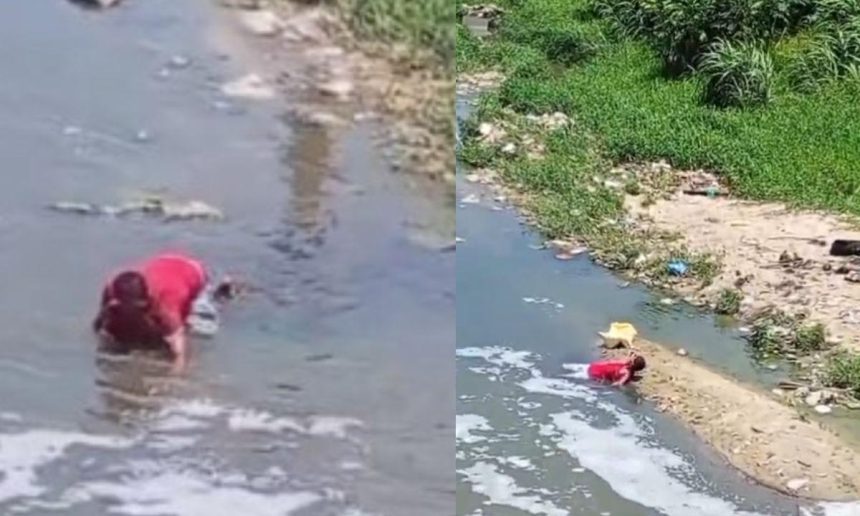 Homem ensanguentado em rio após agressão e esfaqueamento.