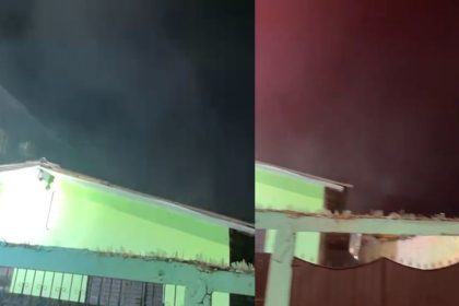 Incêndio em residência no bairro Japiim, Manaus. Fumaça escura e casa em chamas.