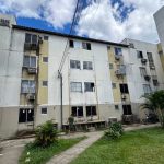 Prédio residencial no programa Viver Melhor, com sinais de falta d'água e possível multa.