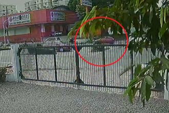 Acidente na Avenida Max Teixeira, com carro vermelho visível.