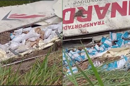 Acidente rodoviário: carreta tombada na AM-010, com carga espalhada.