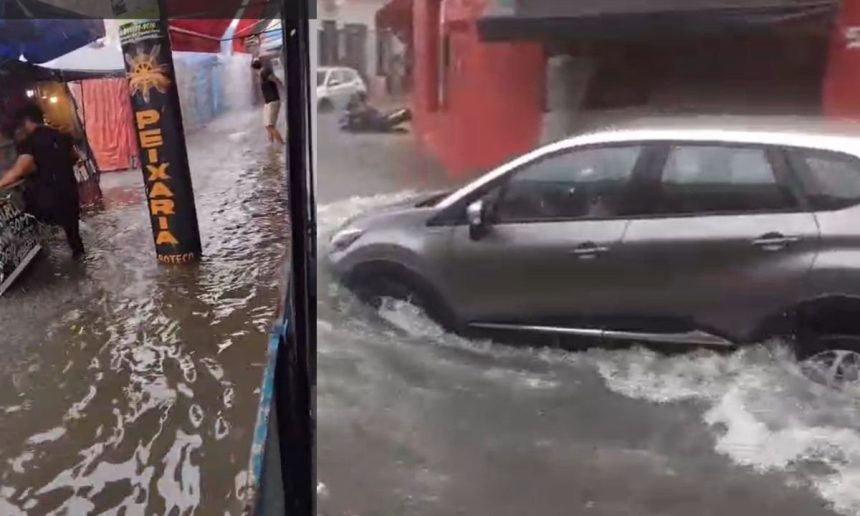 Chuvas fortes causam alagamento em ruas do Centro de Manaus, com carro passando pela água.