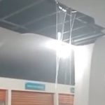 Feira alaga após obra de R$ 1 milhão, mostrando 'cachoeira' no teto durante chuva.