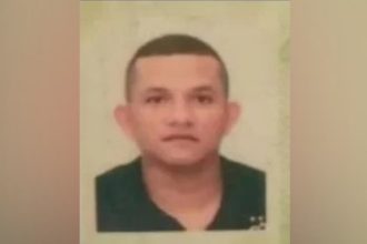 Foto de suspeito preso em Manaus após execução em estacionamento de centro de compras.