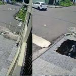 Pedestre cai em buraco após calçada ceder em Manaus.