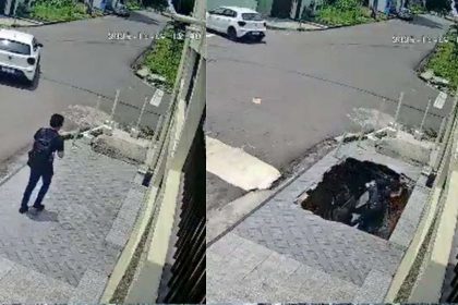 Pedestre cai em buraco após calçada ceder em Manaus.