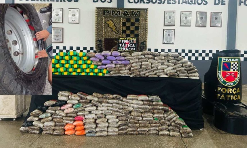 Polícia apreende drogas escondidas em pneu de carreta em Manaus. Tabletes de drogas expostos.
