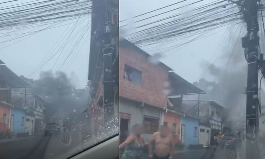 Incêndio em casa na Rua Garça Vermelha, Manaus, com fumaça densa e pessoas correndo.